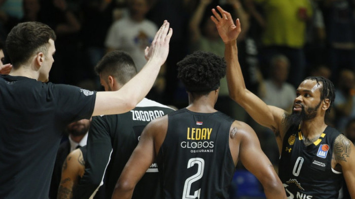 Partizan jednom nogom u finalu: Ledej vodio crno-bele do pobede nad Budućnošću