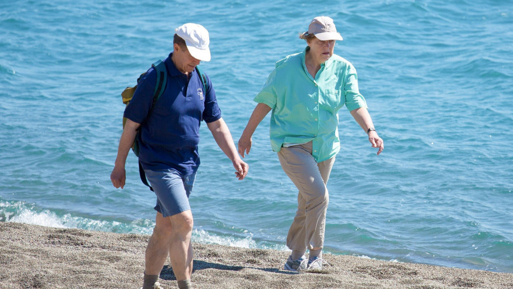 Angela Merkel sa suprugom na odmoru u Salcburgu, da bi imala mir koristi prezime supruga