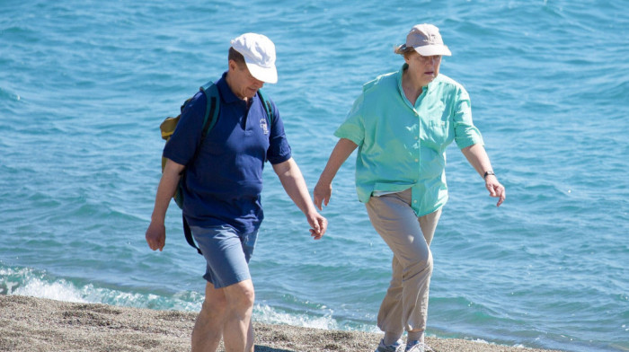 Angela Merkel sa suprugom na odmoru u Salcburgu, da bi imala mir koristi prezime supruga